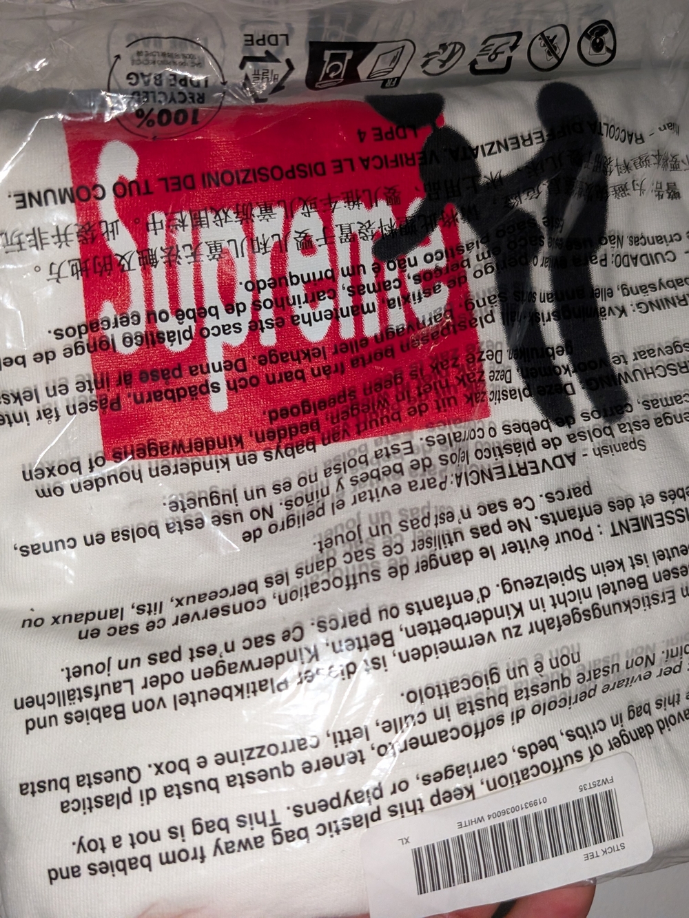 Supreme White Crewneck Tee with Red Logo Tag